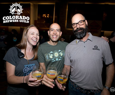 Three people from the colorado brewers guild