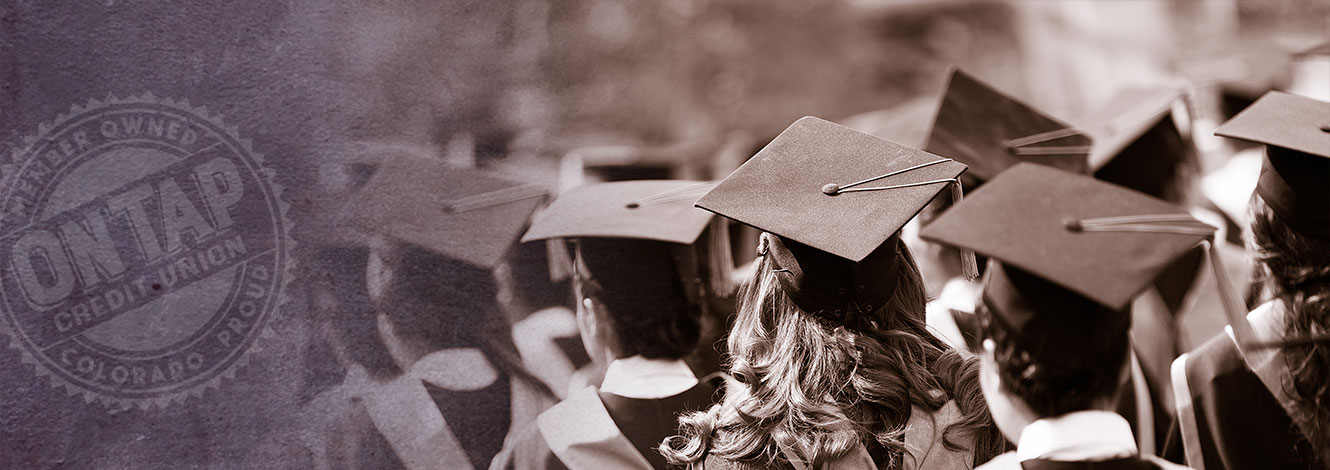 students graduating in cap and gowns