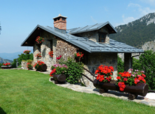 Beautiful mountain home with lush landscaping 