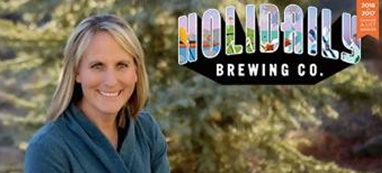 Karen Hertz with Holidaily Brewing logo